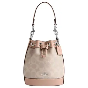 COACH Dempsey 15 Mini Logo Drawstring Bucket Bag in Coated Canvas and Leather for Women