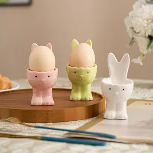 Rabbit-shaped ceramic egg cup with bunny feet, small and fresh, simple decoration for tabletop, living room, and home decor, suitable for home decoration, festival parties, and Easter