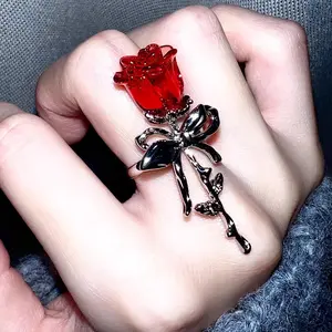 A Unique and Creative Adjustable Thorn Rose Ring. This Adjustable Thorn Rose Ring Features a Red Rose Flower Paired with a Copper Stem Adorned with a Bow. Its Style Is Gorgeous and Romantic, Making It a Fashionable Accessory That Adds a Touch