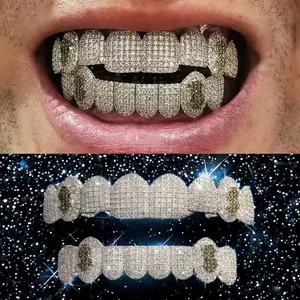 Hot-selling European & American hip-hop tooth jewelry featuring a dollar motif set with rhinestones; eight-tooth HIPHOP fully rhinestone tooth jewelry