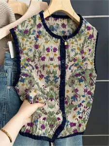 French retro style loose crew neck sleeveless color-block buttoned khaki women's sweater vest with color-block floral and botanical print. Suitable for spring and summer women's wear, versatile women's buttoned sleeveless knitted sweater, vacation style,