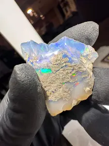 Jewelry Grade Ethiopian Rough with clear lavender base and blue/red play of color or fire Opal