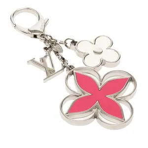 Pre-owned Louis Vuitton Zinc Alloy Small Leather Goods Limy Bag Charm Key Holder