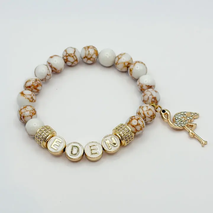 ST song inspired bracelets smooth white howlite with spun gold gemstones