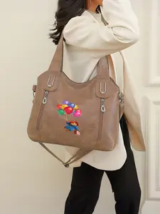 This leather tote bag features Paddington Bear holding colorful balloons and has a zip closure. It's perfect for the back-to-school season and a great New Year's gift.