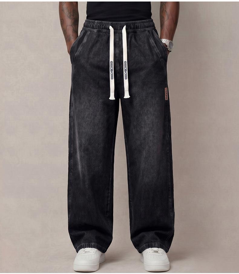 Men’s jeans made from stretchy cotton—comfortable and stylish. Loose fit for everyday wear; long pants with a drawstring elastic waistband design for men. Men’s jeans made from stretchy cotton—comfortable and stylish. Loose fit for everyday wear; long pants with a drawstring elastic waistband design for men.