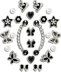 Trendy luxury shoe charms set with retro black and gold vibe, featuring butterfly, whale, and pearl accents, stylish accessories for clogs sandals, adding unique fashionable decoration