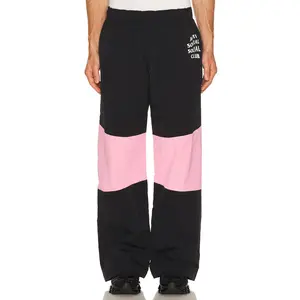 Anti Social Social Club Track Pants in Black & Pink