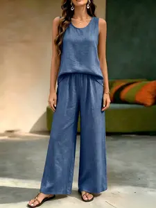 Women’s minimalist sleeveless crew-neck top paired with elastic-waist wide-leg pants—a casual two-piece set that is loose yet slimming, versatile for everyday wear.