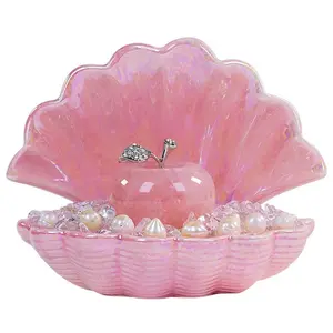 Natural powder crystal ornament, an artifact for recruiting peach blossoms and prosperous marriage, a natural crystal shell home desktop decoration gift