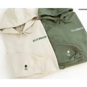 Custom Embroidered Roman Numeral Heart Initial Hoodie, Sweater, Couple Anniversary Date Engagement Gift - Personalized Initial on Sleeve , Global Trending Outfits