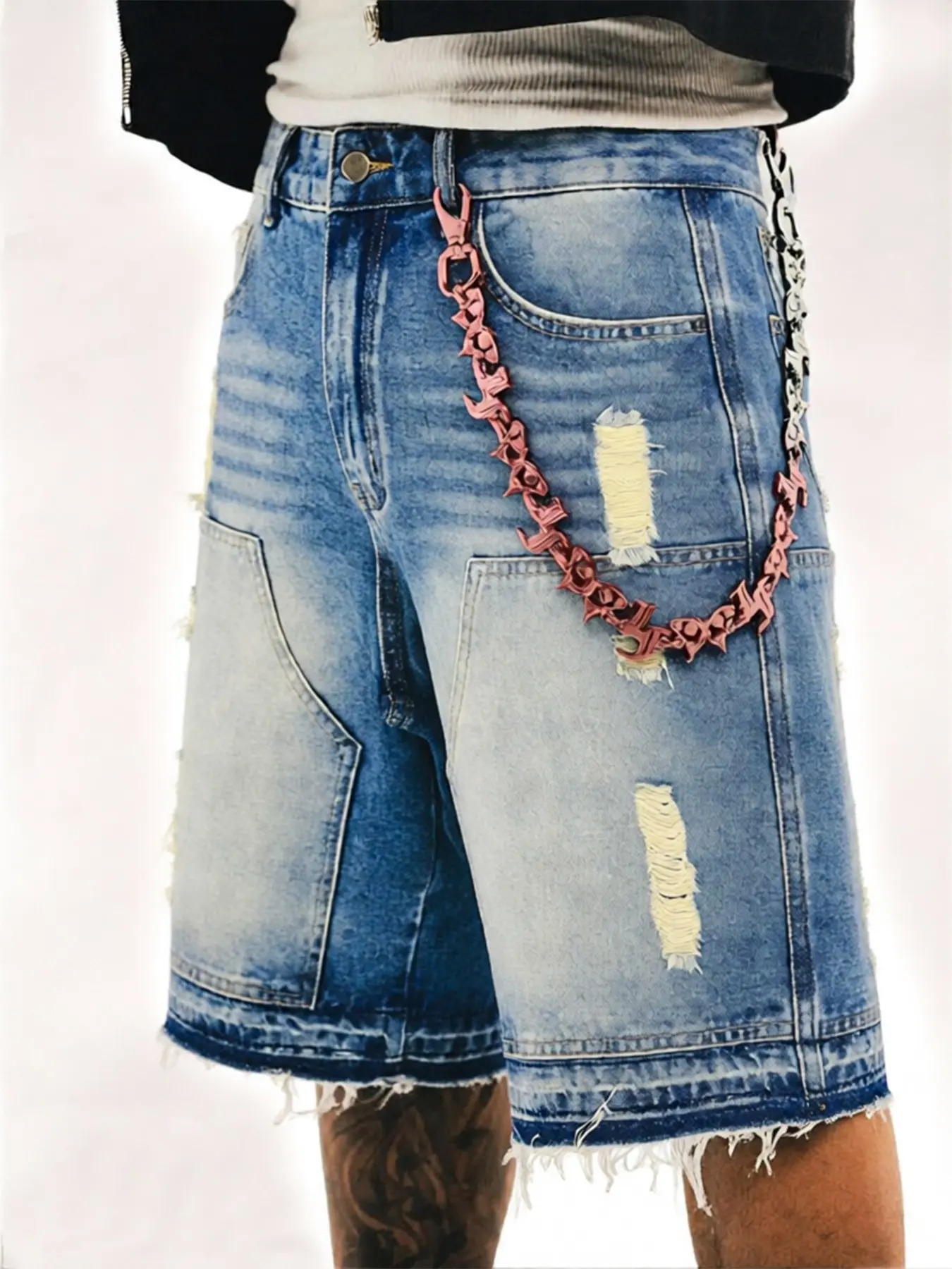 Blue washed and distressed denim shorts, Distressed jean shorts, featuring multiple holes and frayed hems, irregular torn frays create a retro vibe, making them vintage street casual shorts