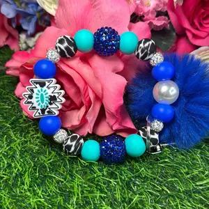 Royal cowhide wristlet keychain color scheme royal blue, turquoise, cowhide and bling beads made with  wire