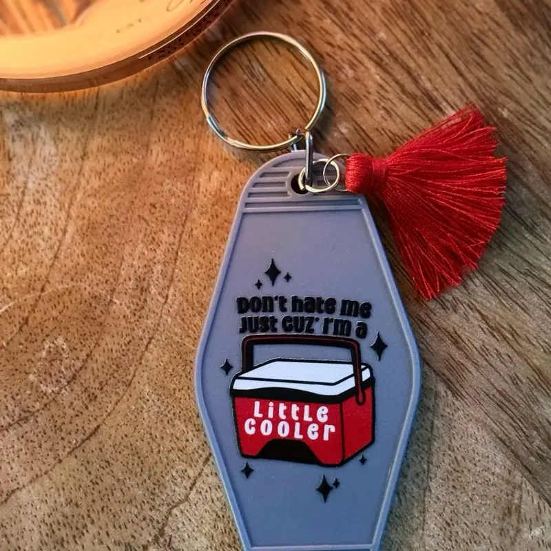 Don't Hate Me Cause I'm A Little Cooler Motel Style Keychain with Red Tassel and Coolers Design