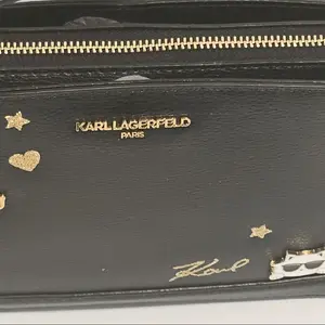 Karl Lagerfeld Paris Lourdes Black Leather Top Handle Womens Mini Purse with Gold Star Accents