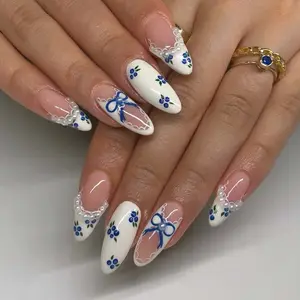 24-piece long almond-shaped blue and white French 3D diamond-studded pearl press-on nails with blueberry bow accent nails