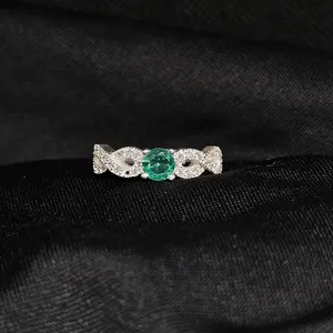 Emerald Infinity Ring – Size 6.5, 2.5g, Silver with CZ Accents