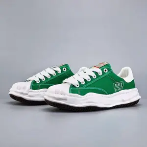 Men’s green canvas and rubber MMY shoes