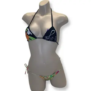 Recco Brazilian Side Tie Bikini. Available in Size Medium. This brand runs small would recommend ordering one size up.