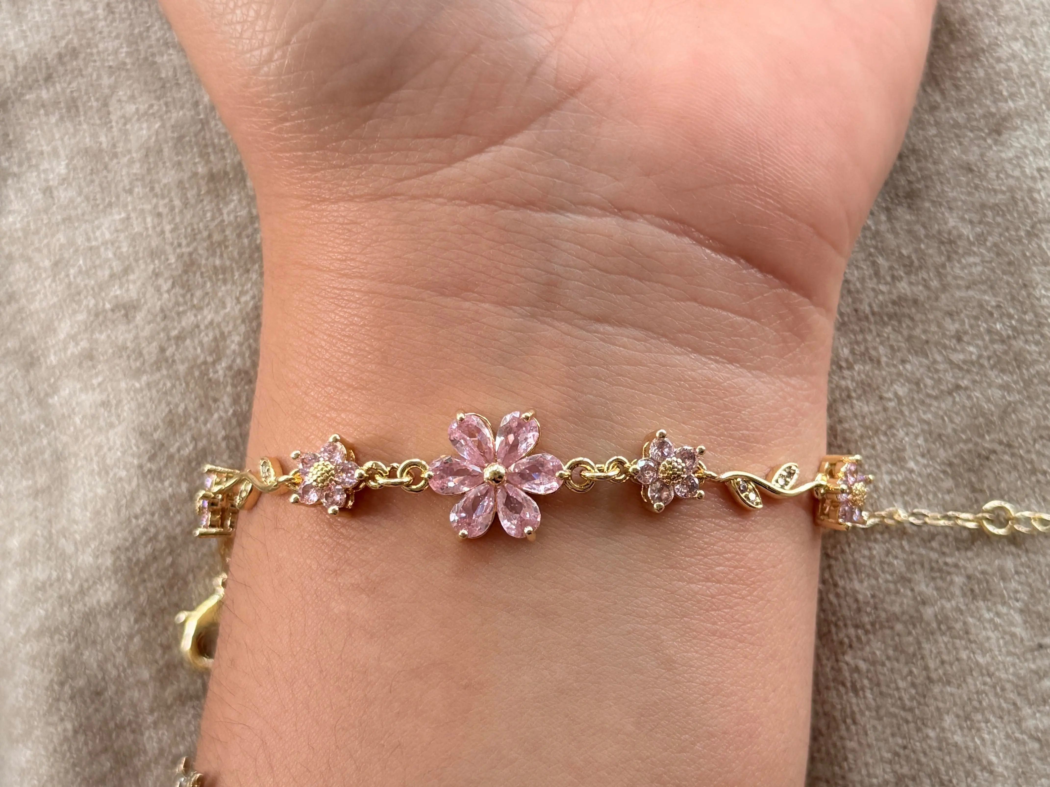 Women's Pink Floral Vine Bracelet, Gold Plated Stainless Steel with Sparkling Cubic Zirconia Flowers and Adjustable Lobster Claw Clasp, Bangles, Plants, Female, All Seasons, Polished Finish, Vine Motifs, Adjustable Length, Year-Round, Everyday, Casual