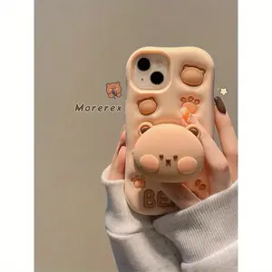 Three - dimensional cartoon - style cute and super - adorable bear stand. Suitable for iPhone 16 Pro Max, 16, 15 Pro, 14 PLUS, 13, 12 Pro, 11 Pro Max, X, XS MAX phone cases. A new and interesting anti - drop soft case for girls, with a niche full - covera