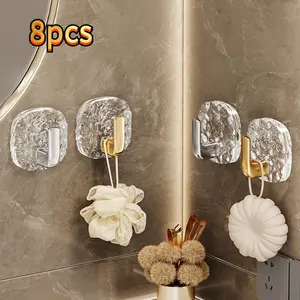 8 powerful and sticky wall hooks with glacier patterns, no drilling required. They are easy to install. These hooks are suitable for use as bathroom towel rack hooks, kitchen utensil rack hooks, and wall-mounted storage hooks. portable storage organizer