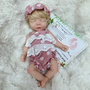 Newborn 10-inch reborn baby girl doll, silicone material, soft body, handmade, realistic lifelike details, includes a bottle and birth certificate. Ideal as a birthday gift, for collectors, and a perfect gift for children.