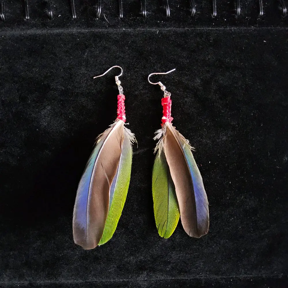 Jack and gus feather earings