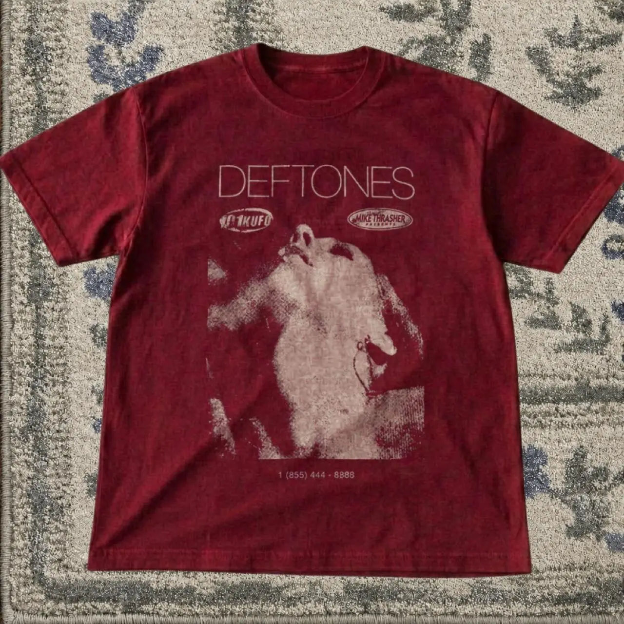 Deftones band tee with white graphic of a person with the words DEFTONES shirt