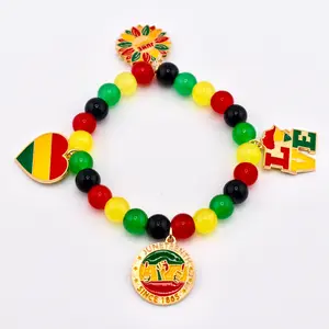 Juneteenth Charm Bracelet with Red Yellow Green and Back Glass Beads and Gold Accents
