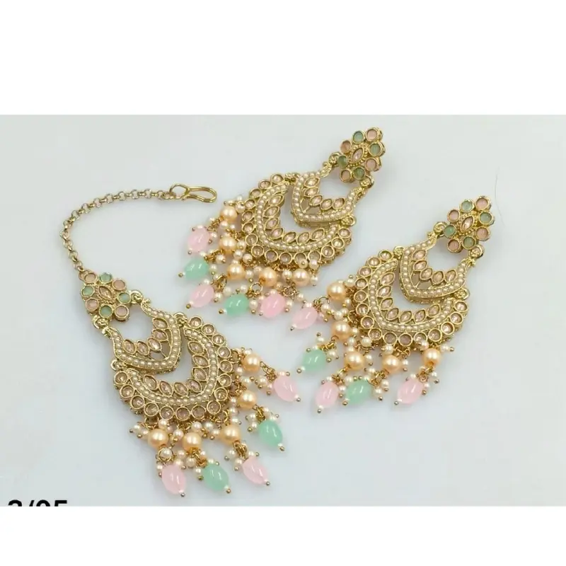 Baahubali Earrings and Tikka Set with Elegant Design, Featuring Gold Tassels and Decorative Elements, Perfect for Special Occasions (NO REFUND OR EXCHANGE)