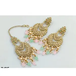 Baahubali Earrings and Tikka Set with Elegant Design, Featuring Gold Tassels and Decorative Elements, Perfect for Special Occasions (NO REFUND OR EXCHANGE)