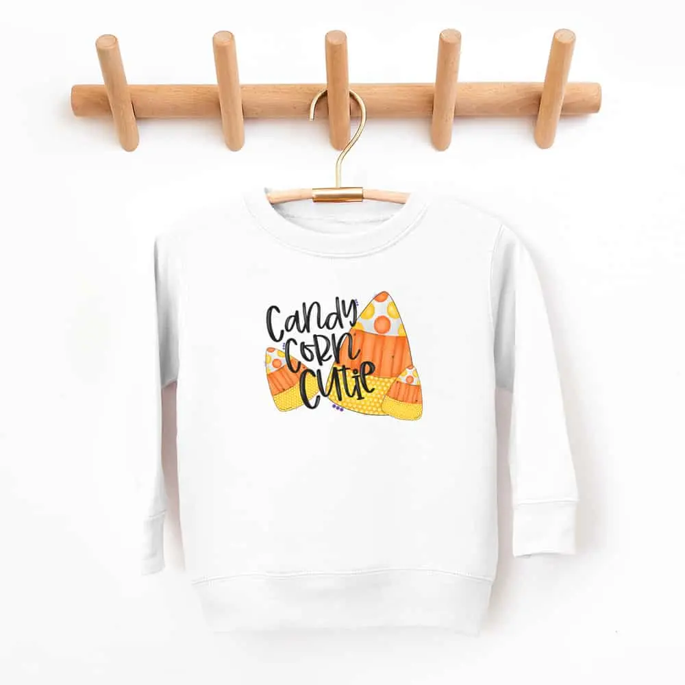 Candy Corn Cutie Fall Sweatshirt - Soft White Fleece with Candy Corn Graphic and "Candy Corn Cutie" Text