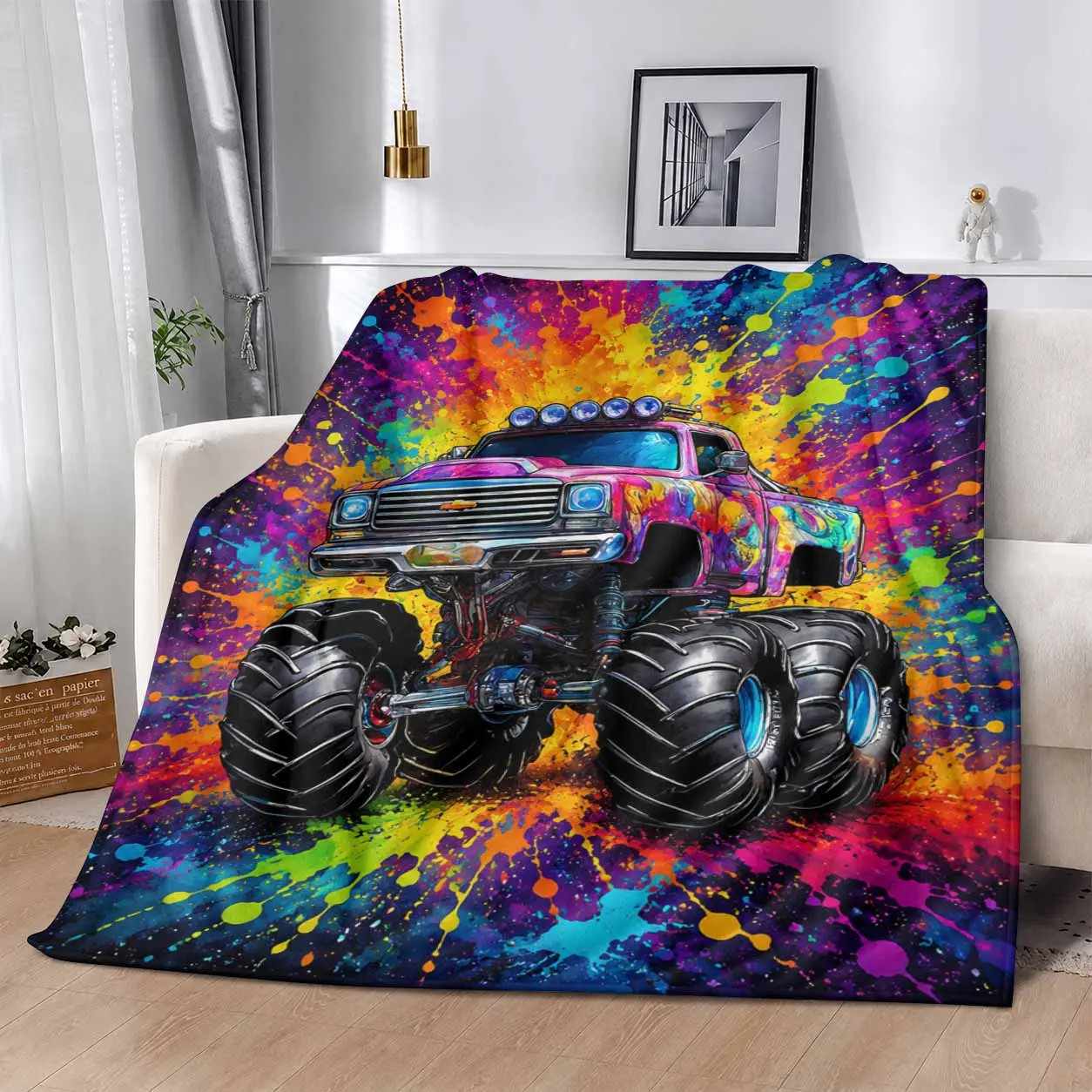Perfect for bed. sofa. camping. chilly movie theater or travel! A perfect gift for your family and friends. Monster Truck Flannel Blanket. Vibrant Colorful Paint Splatter Pattern. Soft Lightweight Plush Throw. Suitable for bedroom and living room.