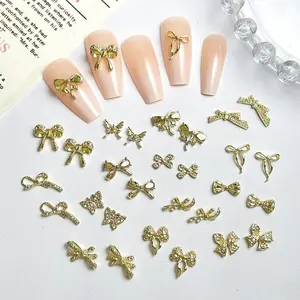 100PCS Glossy Y2K Alloy Bow Series Nail Charms 3D Irregular Gold White K Bowknots Tie Nail Decor DIY French Style Nails