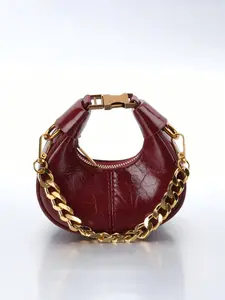 Chic wine red crescent shaped crossbody bag, sleek metal chain detail and mini size. Timeless vintage design, soft and stylish as a daily shoulder bag