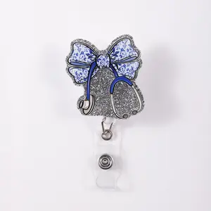 1pc Badge Reel Elegant ID Holder with Pattern Bow & Stethoscope, Brighten Your Workday with Stylish Functionality