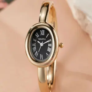 Women's Tone Bangle with Roman Numerals and Elegant Design Ladies Quartz Watch Plated Gold