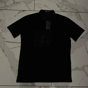 BP black men’s polo