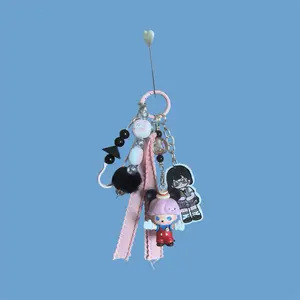 Adorable Keychain with Pink Ribbon, Black Beads, and Character Charms for Personalized Style