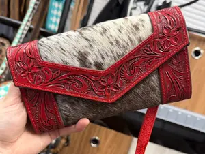 Genuine hand tooled leather & cowhide accordion style wallet- comes with wristlet strap and crossbody strap