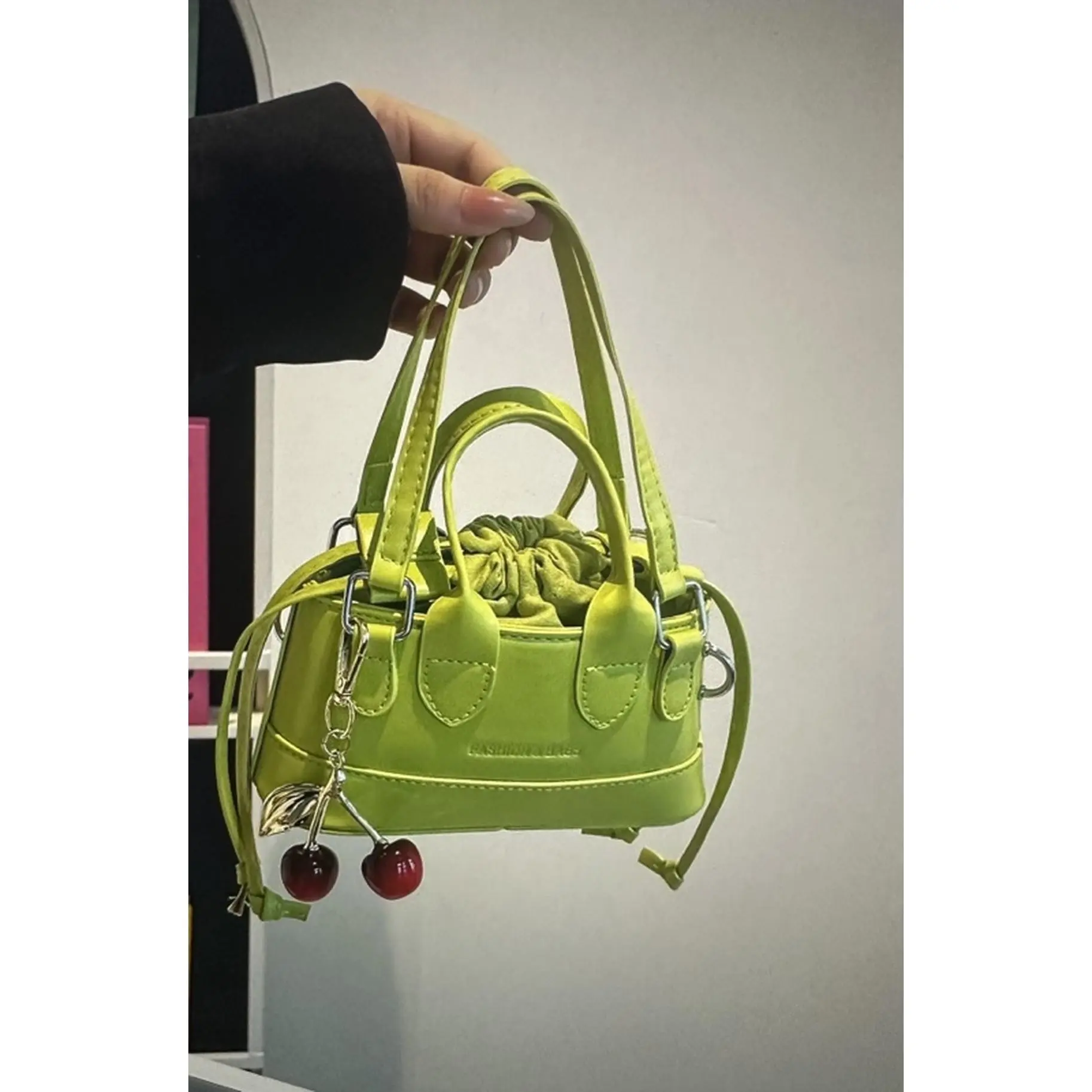 Green & Pink Handbag with Cherry Charm and Adjustable Straps for Women