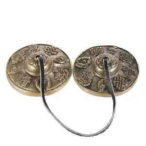 Tibetan Handcrafted Meditation Cymbals with Decorative Engravings and Cord Attachment for Enhanced Mindfulness and Inner Peace 2.6" Lightweight Portable Design