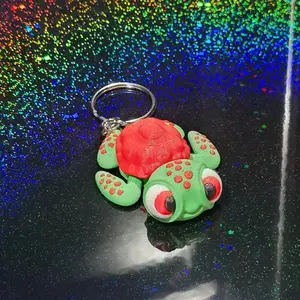 3D Printed Happy Sea Turtle Keychain Red Shell Green Body for Backpacks Purses Bags and Lanyard Accessories Fun and Colorful Design