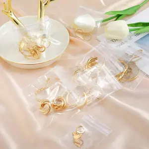 200pcs Self-Sealing Transparent Plastic Jewelry Bags | Thick OPP Bags, Seam-Proof Polyethylene Bags in 4 Sizes for Rings, Earrings, and Necklaces