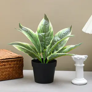 1count The artificial magnolia leaf potted plant has simulated leaves and is suitable for home decoration in desks, living rooms and bathrooms Fake Plant Decoration