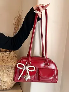 Niche design texture Small square bag, vintage handbag with an exquisite pearl bow and heart-shaped pendant, Crossbody shoulder handbag, double-pocket shoulder bag, versatile, suitable for daily use, commuter bag