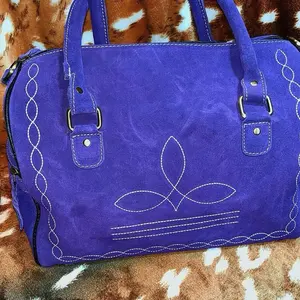 Purple soft speedy bag