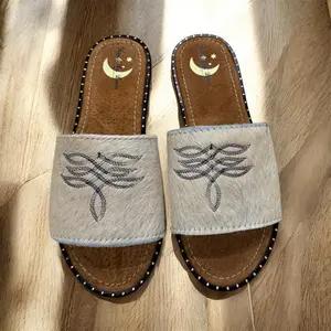 Cream Cowhide Sandals (size 8)