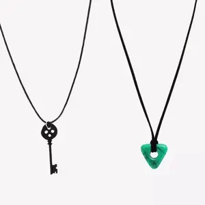 Coraline Adder Stone - Black and Green Design with Black Cord and Loop.